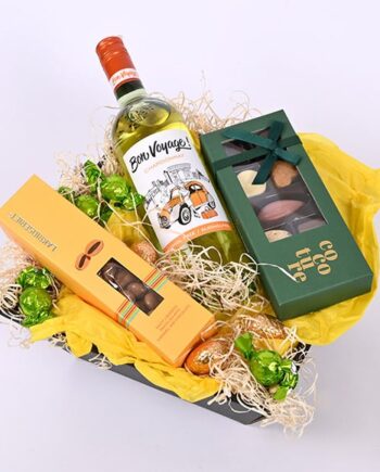 Festlig Påskekurv med Alkoholfri Vin og Forårsblomster